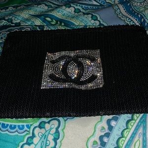 Fun little upscale cc clutch! BLk sequins with rhinestone In center by logo new!